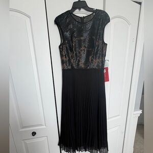 NWT, dressy dress , sleeveless with pleats
